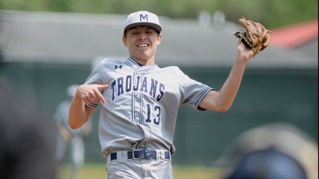 Sometimes it's better to be lucky than good. Duffy Gallagher of McDowell (Erie, PA) sticks his glove up and snags this hard comeback liner. Even Gallagher can't believe it.