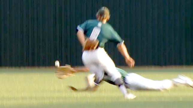 Rudder High senior Brian Williams covers some serious ground on this pop-up into No Man's Land, snaring the ball inches from grass blades.