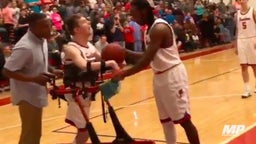 Quadriplegic boys basketball player marks special moment