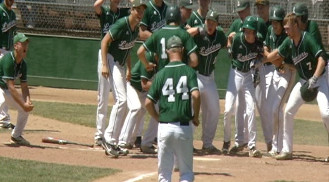 Do you believe in miracles? Down by three runs with three outs left in their season, Hayden Hoiness of the La Crescent Lancers (MN) cranked a walk-off grand slam to go to the state championship.