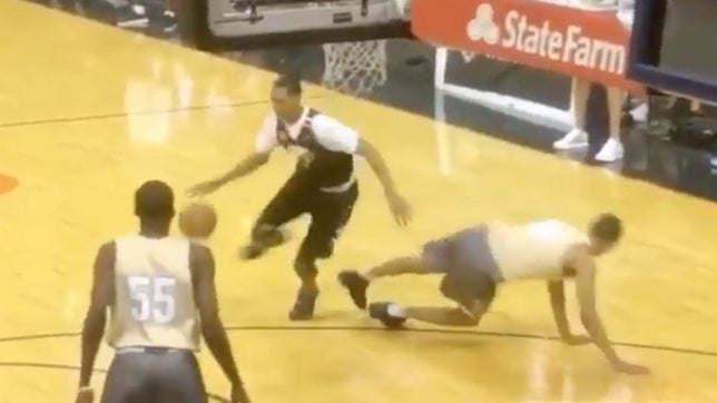 Darius Bazley of Princeton (Cincinnati, OH) puts his defender in a spin cycle and drops him to the floor in this exhibition game. Bazley is the No. 1 recruit in the state of Ohio. Overtime.com