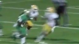 Michigan commit stiff arms and takes defense for a ride