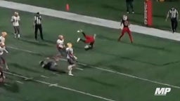 Front flip over defender into the end zone