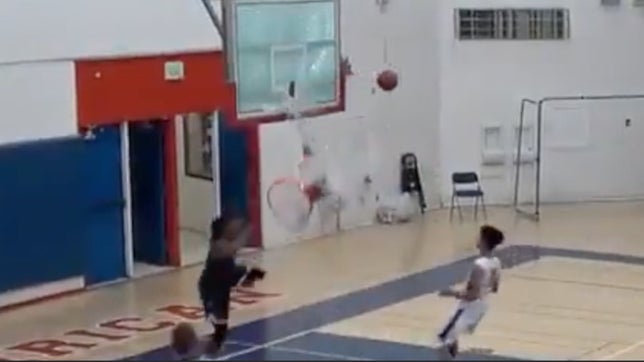 Hopefully Merrill West (CA) has insurance on their basketball hoops because Michael Hayes absolutely destroys one. Hayes takes the fast break jam to a whole other level by breaking the rim and shattering the backboard.