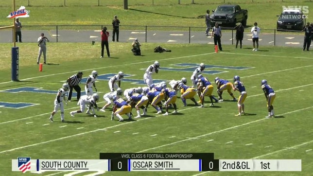 QB Ethan Vasko, RB Kevon King and Oscar Smith with a 62-21 Class 6 title win over South County.