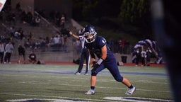 Carter Schultz (#11) throws a touchdown pass to Warren Woo (#43)