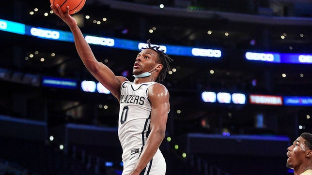 Trailblazers junior scores 19 against father's alma mater in front of star-studded Staples Center crowd.