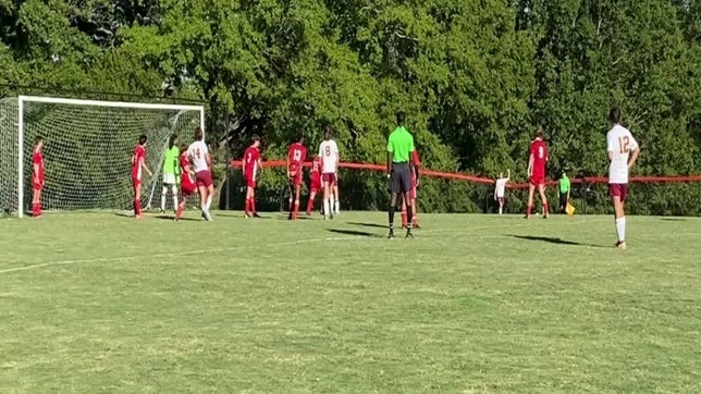 Cooper scores an Olympico against Cornerstone Charter.