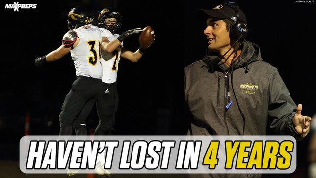 Coach Dylan Schmidt has alma mater rolling with 51 straight victories, including four state championships.