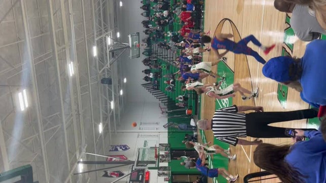 #1 Junior Donovan Brown makes a 3 pt shot against Winfield