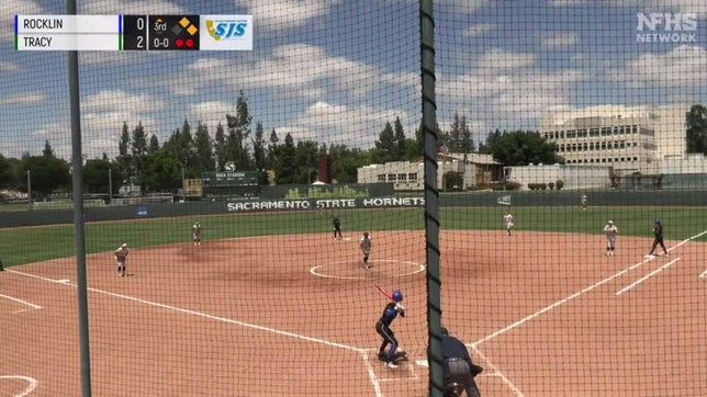 Rocklin's Syd Barker hits a bomb over the scoreboard in the D2 section title game.