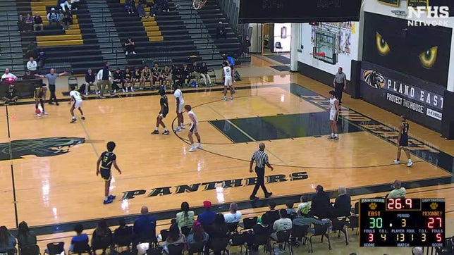 Plano East senior Izan Qazi rocks the rim after steal.