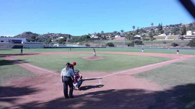 Emerson Hamilton fields a slow roller to third and throws to first on the run, beating the runner by half a step to end the inning.