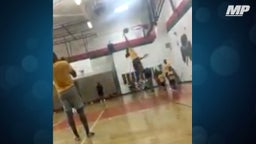 13-year old girl dunks