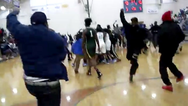 Burke's (SC) guard Karimah Jenkins knocks in a half-court shot to advance to the state final game against Timmonsville.