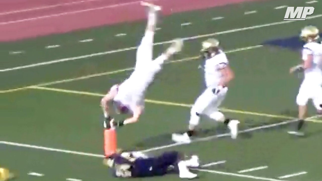 Gavin Reinwald spins, keeps balance, & flips into endzone