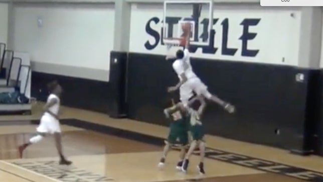 5-star Gerald Lidddell of Cibolo Steele (TX) dunks over the defender while drawing the foul.