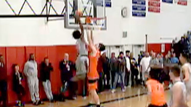 Nathan Hale's sophmore guard, P.J. Fuller with the thunderous tomahawk slam. Presented by The United States Coast Guard