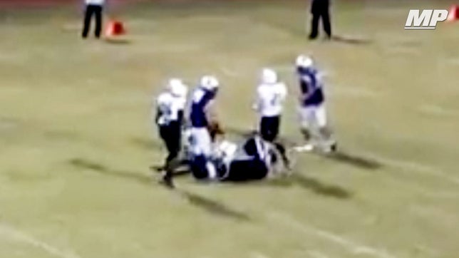 Episcopal's (TX) 5-star offensive tackle Walker Little throws two guys to the ground, and one of them takes out the ref.