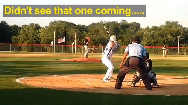 Graham Tews slides between his teammates legs as he steals home. (Via @DrewEich14)