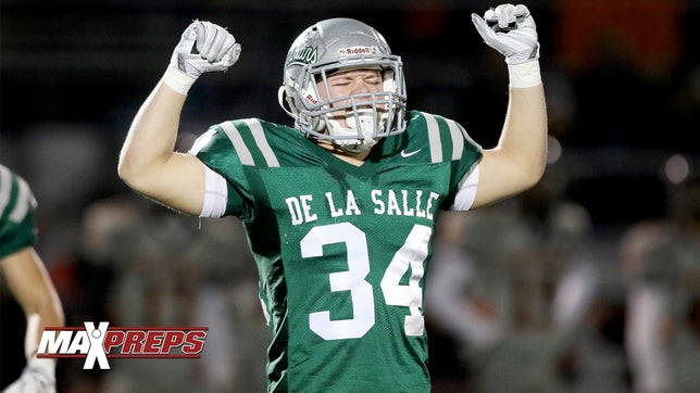 http://www.maxpreps.com/high-schools/de-la-salle-spartans-(concord,ca)/football/schedule.htm

De La Salle (CA) shutout Pittsburg 35-0 to win their 23rd consecutive North Coast section title and they take on Corona Centennial in the CIF Open Division state championship on December 20.