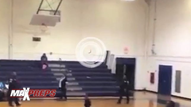 A bat interrupts a high school basketball game between Stratford and Cross.