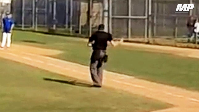 The ump just couldn't contain himself when his jam came on at the Kennedy vs. Valencia baseball game.