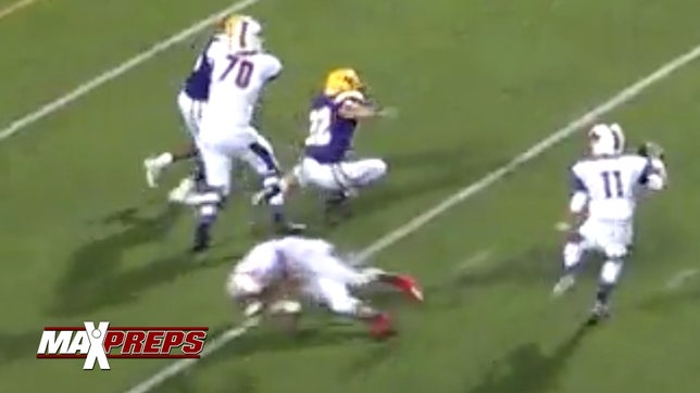 Richardson's (TX) Cade Corey leaps over a blocker and sacks the quarterback and forces a fumble.