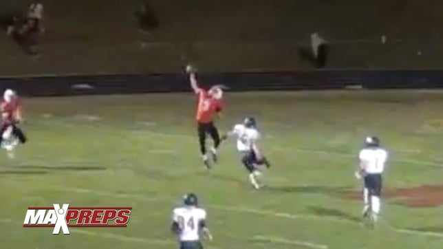 Hesston's (KS) Scott Duerksen makes a legit one-handed catch for six against Pratt (KS).