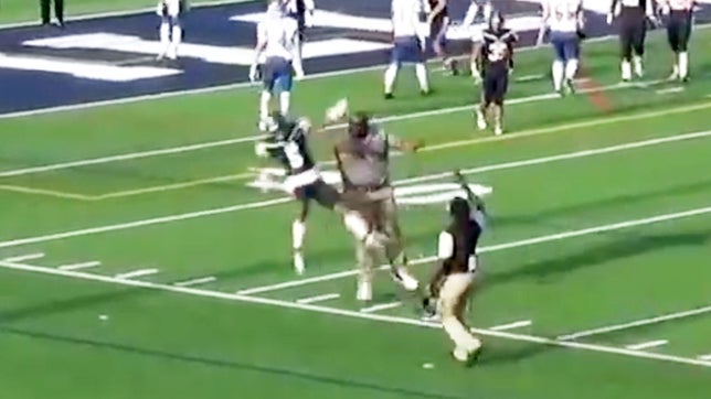 A coach at Village (TX) high school chests bumps his quarterback after a touchdown and sends him flying to the ground.

Video courtesy of Kaelin Robinson (K_ROB77).