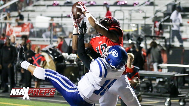 http://www.maxpreps.com/athlete/damarkus-lodge/UN9D9fTvEeKZ5AAmVebBJg/default.htm

Cedar Hill's (TX) reels in this 21-yard touchdown grab in their 62-42 win against Southlake Carroll in the 6A D2 quarterfinals.