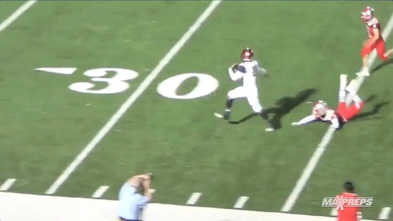Running Back hurdles two defenders for long score