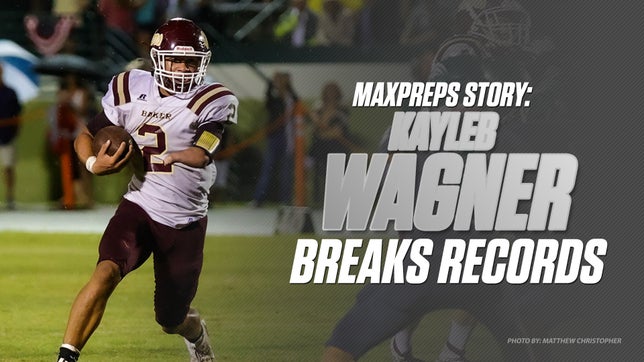 Reigning NFL Offensive Player of the Year congratulates one-handed running back for his 535-yard, six-touchdown performance that put Wagner above Henry and all other Floridians in the record books.