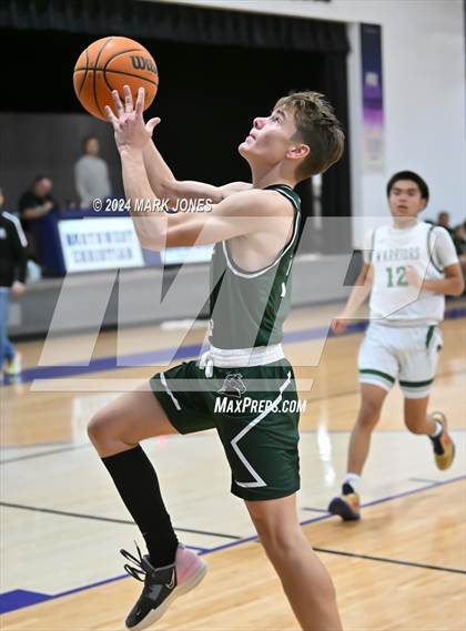 Thumbnail 1 in  Arete Prep vs. Tuba City (ALA Coyotes Basketball Invitational) photogallery.