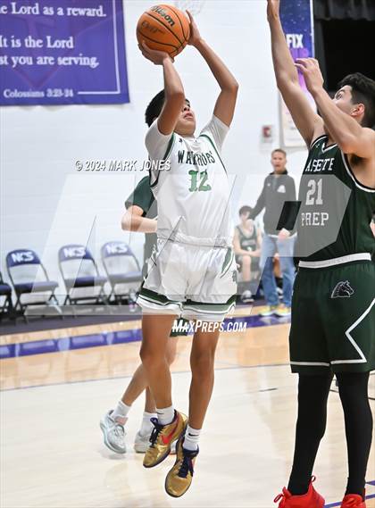 Thumbnail 1 in  Arete Prep vs. Tuba City (ALA Coyotes Basketball Invitational) photogallery.