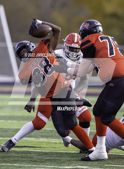Thumbnail 3 in Triad @ Centralia (IHSA 5A First Round Playoffs) photogallery.
