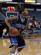 Malcolm Washington (3) is pass first, shoot second point guard.