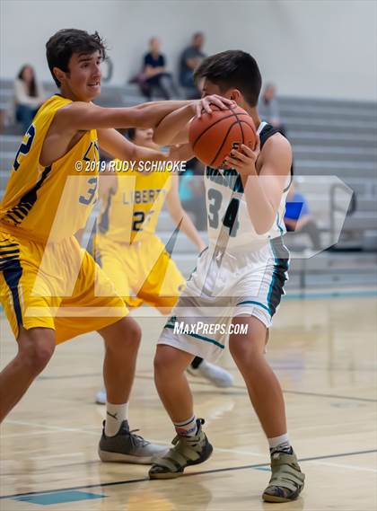 Thumbnail 1 in Guajome Park Academy vs. Liberty Charter (Del Lago Tip-Off Classic) photogallery.