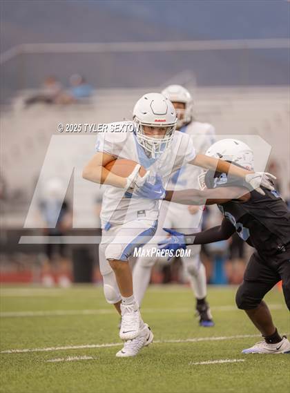 Thumbnail 2 in Mica Mountain Black Vs Blue (Scrimmage) photogallery.