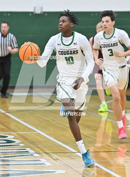Thumbnail 1 in Mountain Ridge vs. Phoenix Christian (Sunnyslope Hoopsgiving Basketball Tournament) photogallery.