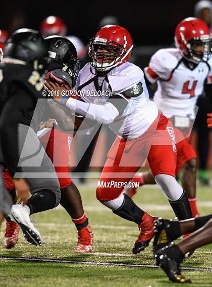 Thumbnail 1 in JV: Cedar Hill (Red) vs Mansfield (Gold) photogallery.