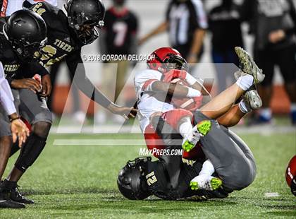 Thumbnail 1 in JV: Cedar Hill (Red) vs Mansfield (Gold) photogallery.