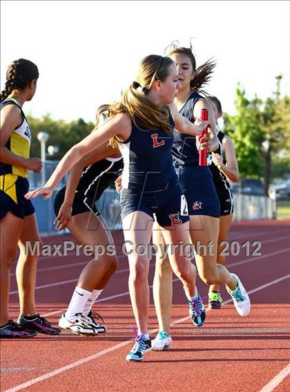 Thumbnail 2 in Titan Top 9 Invitational (Girls 4x400m Relay) photogallery.