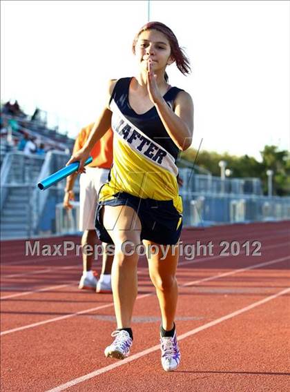 Thumbnail 1 in Titan Top 9 Invitational (Girls 4x400m Relay) photogallery.