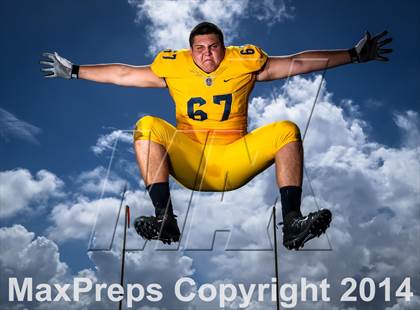 Thumbnail 2 in St. Thomas Aquinas (2014 Preseason Top 25 Photo Shoot)  photogallery.