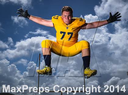 Thumbnail 3 in St. Thomas Aquinas (2014 Preseason Top 25 Photo Shoot)  photogallery.