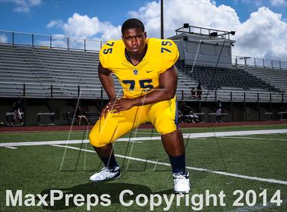 Thumbnail 2 in St. Thomas Aquinas (2014 Preseason Top 25 Photo Shoot)  photogallery.