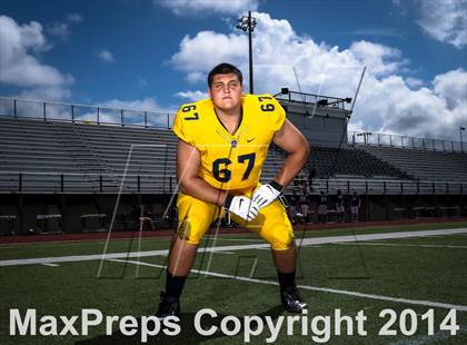 Thumbnail 2 in St. Thomas Aquinas (2014 Preseason Top 25 Photo Shoot)  photogallery.