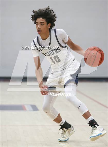Thumbnail 1 in Lake Ridge vs. Wylie East (Denton Ryan Holiday Showcase) photogallery.