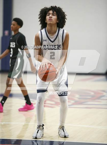Thumbnail 2 in Lake Ridge vs. Wylie East (Denton Ryan Holiday Showcase) photogallery.